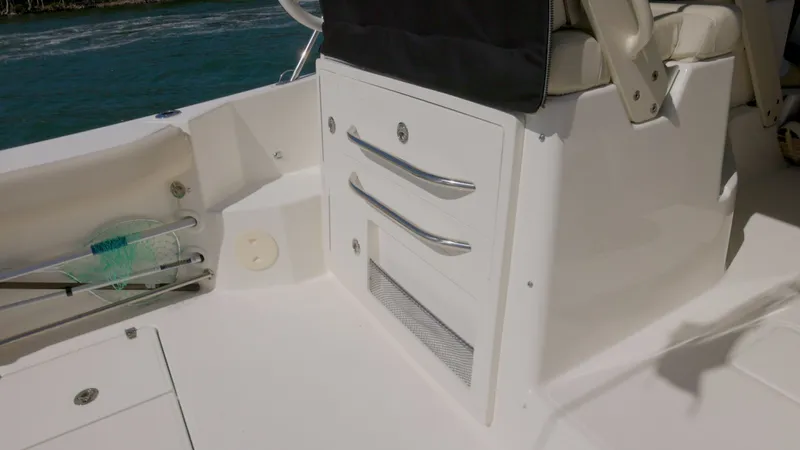 Salt Yacht Photos Pics Interior of 2023 Boston Whaler 325 Conquest with storage and seating.
