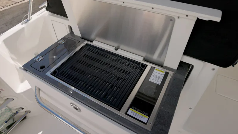 Salt Yacht Photos Pics Grill on a 2023 Boston Whaler 325 Conquest boat.