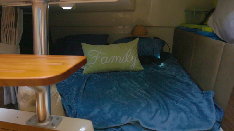 Salt Yacht Photos Pics Interior of 2023 Boston Whaler 325 Conquest with cozy bed.