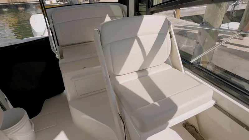 Salt Yacht Photos Pics Interior of 2023 Boston Whaler 325 Conquest with beige seating.