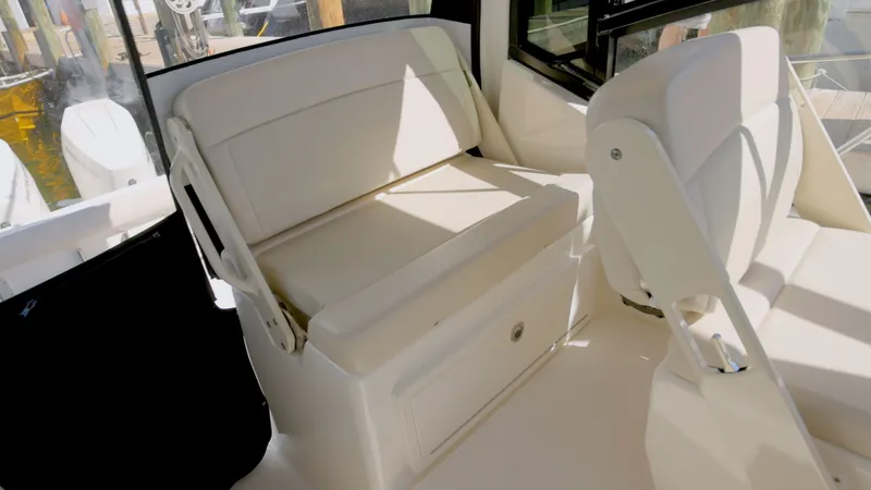 Salt Yacht Photos Pics Interior of 2023 Boston Whaler 325 Conquest with beige seating.