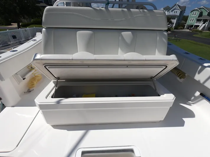  Yacht Photos Pics 2019 Invincible 39 CC boat with open storage compartment on deck.