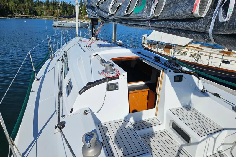 Ace Yacht Photos Pics Sailboat Farr 395, 2001 model, docked with open cabin, scenic water view.