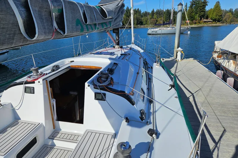 Ace Yacht Photos Pics Sailboat docked at marina, Farr 395 model, 2001, with visible deck and rigging.