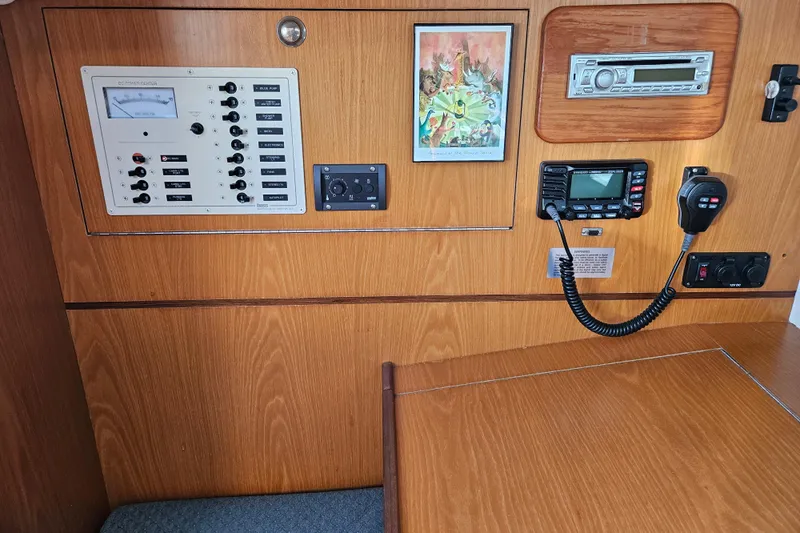 Ace Yacht Photos Pics Control panel of a 2001 Farr 395 yacht with radio and audio system.