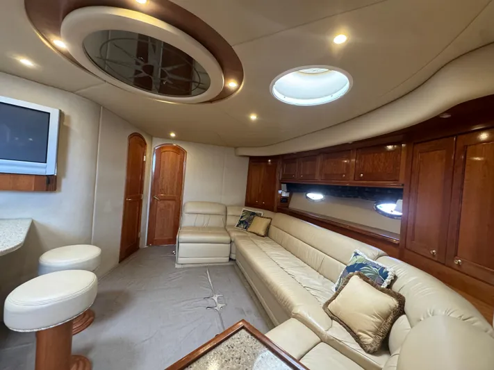  Yacht Photos Pics Luxurious interior of 2003 Cruisers Yachts 540 Express with elegant seating and modern amenities.