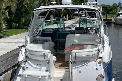  Yacht Photos Pics 2008 Doral Medditerra boat docked, featuring spacious seating and modern amenities.