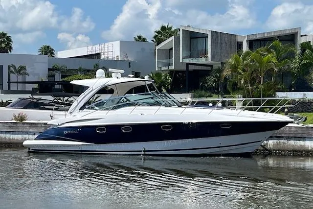  Yacht Photos Pics 2008 Doral Medditerra yacht docked by modern waterfront homes.