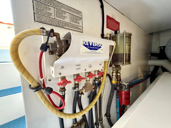  Yacht Photos Pics Engine room of 2001 West Bay Sonship 58 Pilothouse with Reverso oil change system.