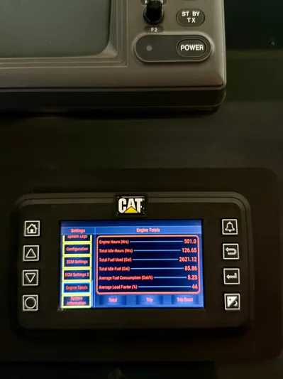  Yacht Photos Pics CAT engine monitor displaying performance data on a 2001 West Bay Sonship 58 Pilothouse.