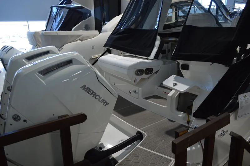  Yacht Photos Pics 2023 Sea Ray DAO 370 boat with Mercury engines in showroom.