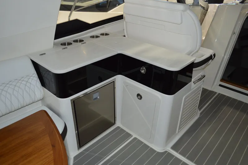  Yacht Photos Pics 2023 Sea Ray DAO 370 yacht interior with sleek kitchenette and modern design.