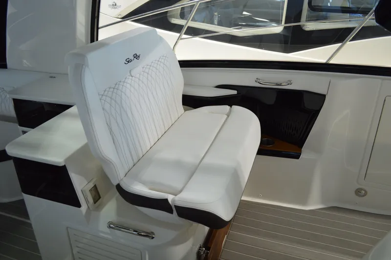  Yacht Photos Pics Luxury seating on 2023 Sea Ray DAO 370 boat, featuring sleek white upholstery.