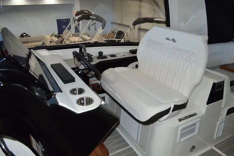  Yacht Photos Pics 2023 Sea Ray DAO 370 boat interior with white seating and modern controls.