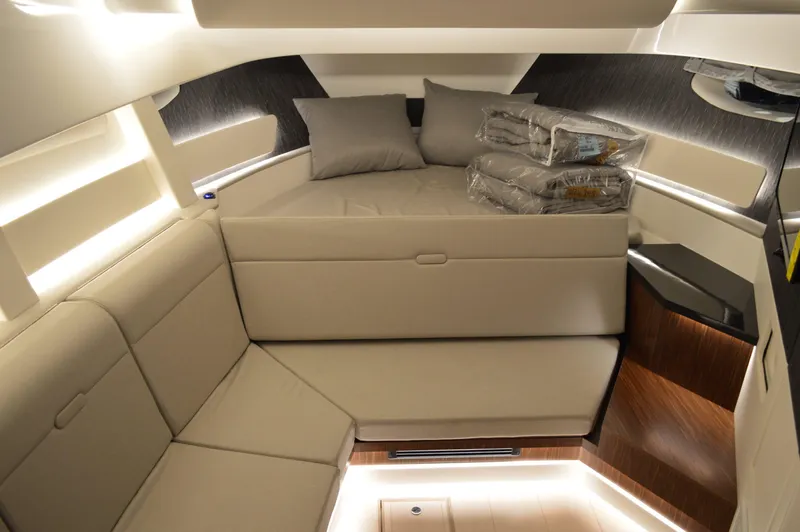  Yacht Photos Pics Luxurious interior of 2023 Sea Ray DAO 370 yacht with modern seating and ambient lighting.