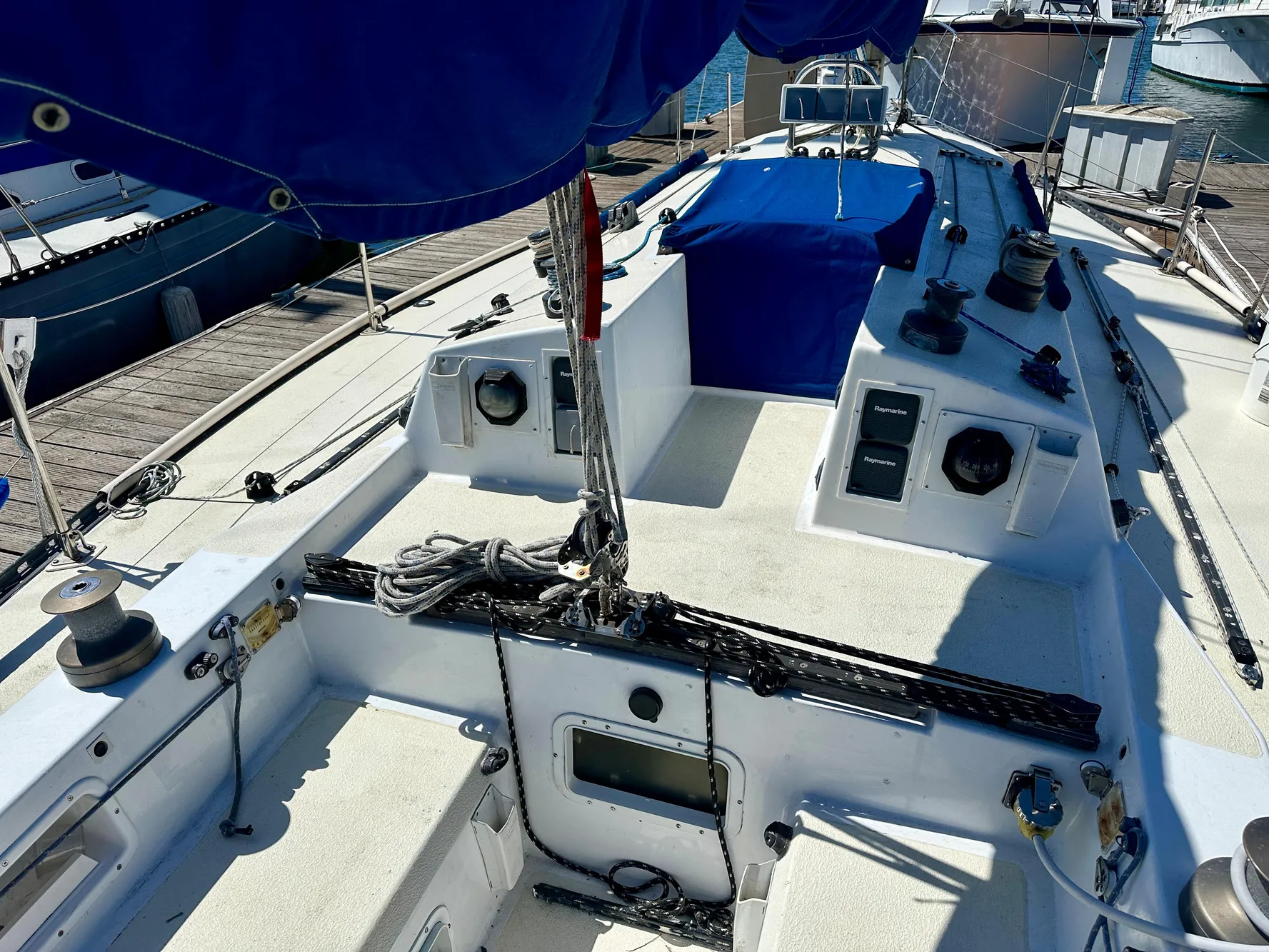 1982 Schock NY 36 sailboat at dock, deck view.