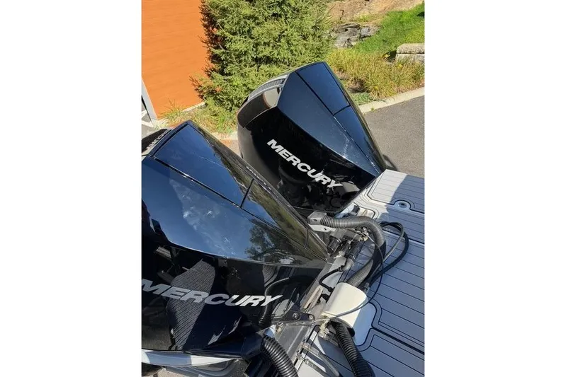  Yacht Photos Pics 2019 Sea Ray SDX 290 Outboard with dual Mercury engines, docked outdoors.