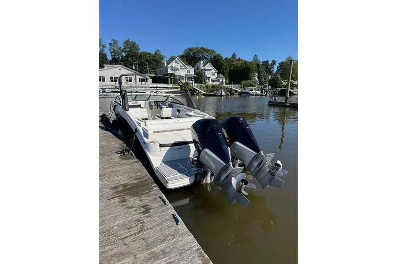  Yacht Photos Pics 2019 Sea Ray SDX 290 Outboard docked at a marina, featuring dual engines.