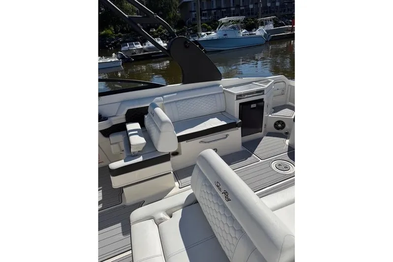  Yacht Photos Pics 2019 Sea Ray SDX 290 Outboard boat interior with white seating and modern design.