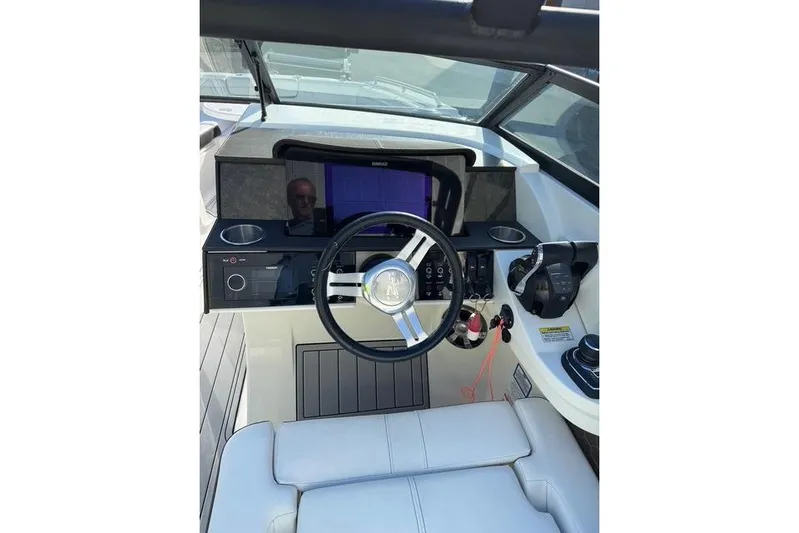  Yacht Photos Pics 2019 Sea Ray SDX 290 Outboard helm with modern controls and steering wheel.