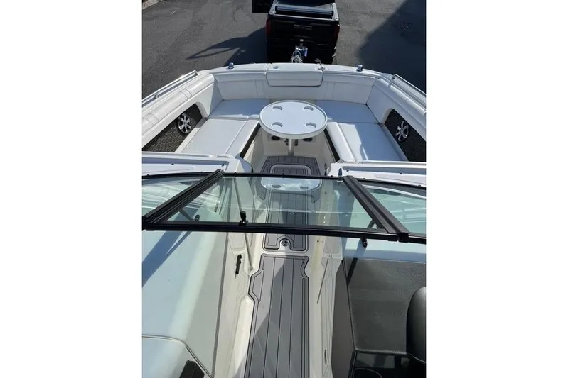  Yacht Photos Pics 2019 Sea Ray SDX 290 Outboard boat interior with seating and table.