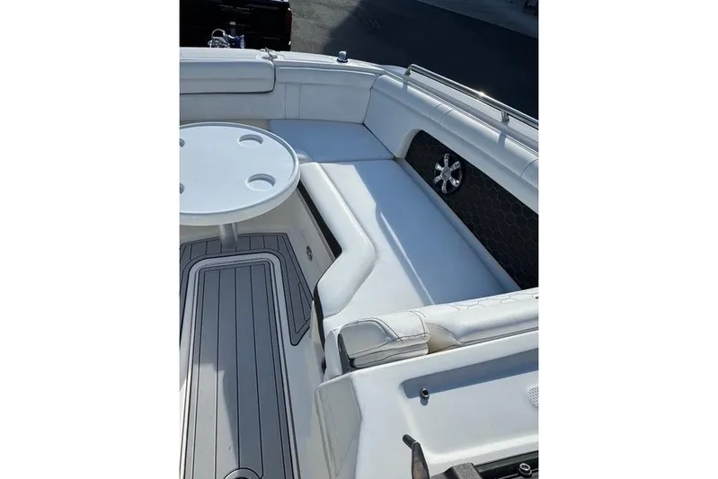  Yacht Photos Pics 2019 Sea Ray SDX 290 Outboard boat interior with white seating and table.