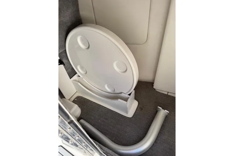  Yacht Photos Pics 2019 Sea Ray SDX 290 Outboard interior with a folded table and hose.
