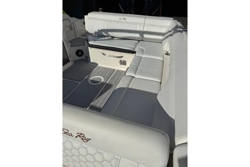 Yacht Photos Pics 2019 Sea Ray SDX 290 Outboard boat interior with white cushioned seating and sleek flooring.