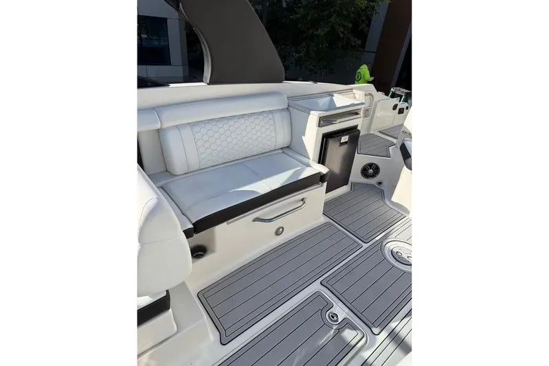  Yacht Photos Pics 2019 Sea Ray SDX 290 Outboard interior with white seating and sleek flooring.