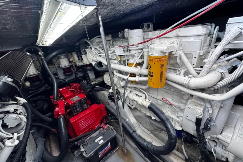  Yacht Photos Pics Engine room of a 1999 Sea Ray 440 Express Bridge with visible components and wiring.