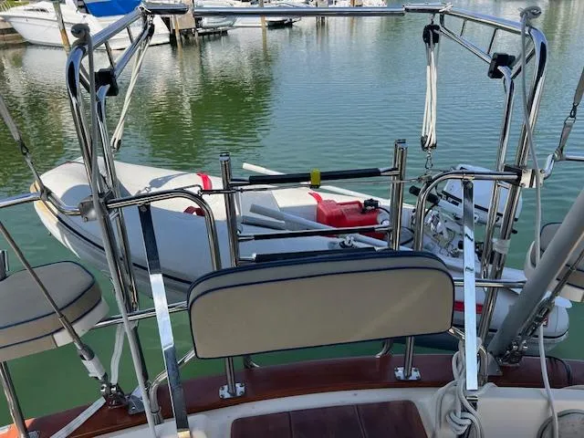  Yacht Photos Pics Sailboat Island Packet 380, 1999 model, with dinghy at marina.