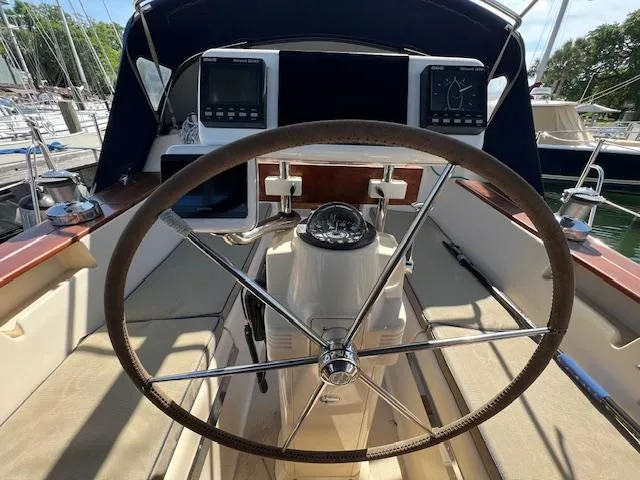  Yacht Photos Pics Steering wheel and navigation instruments on a 1999 Island Packet 380 sailboat.