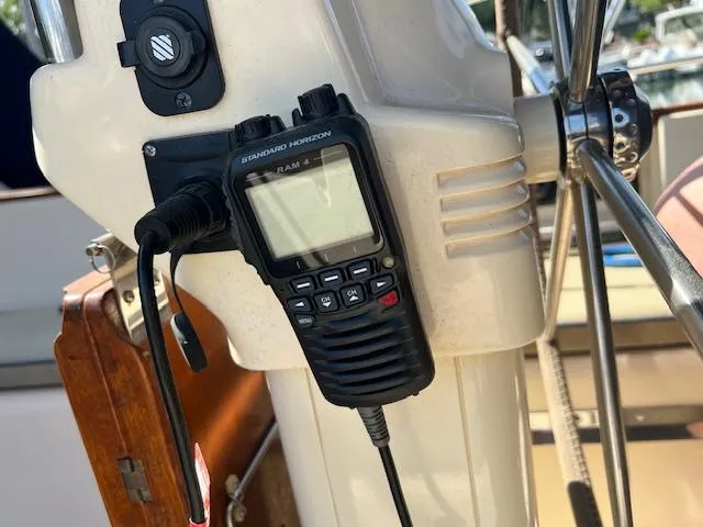  Yacht Photos Pics VHF radio on Island Packet 380 sailboat, 1999 model, mounted near steering wheel.
