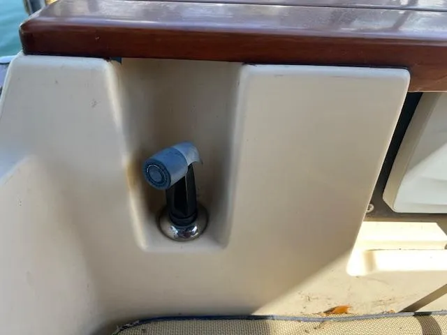  Yacht Photos Pics Close-up of a 1999 Island Packet 380 boat's cockpit detail with a mounted fitting.