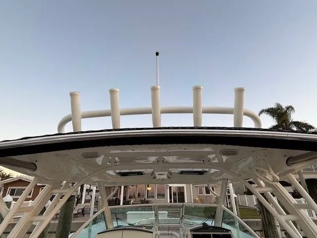  Yacht Photos Pics 2017 Boston Whaler 320 Vantage with rod holders at sunset.