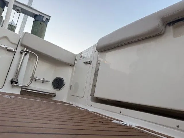  Yacht Photos Pics Interior view of 2017 Boston Whaler 320 Vantage with wood flooring.