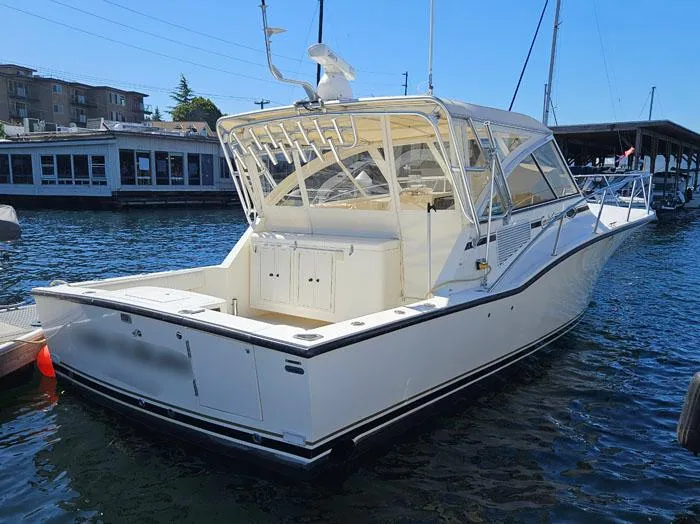  Yacht Photos Pics 2001 Carolina Classic Express 35 boat docked in marina, rear view.