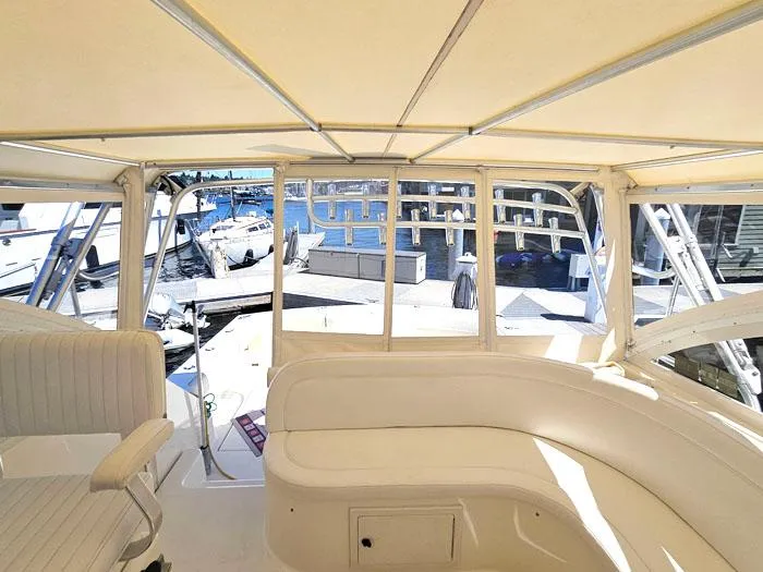  Yacht Photos Pics Interior view of a 2001 Carolina Classic Express 35 boat at a marina.