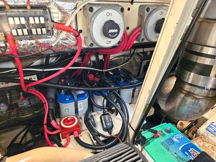  Yacht Photos Pics Engine room of 2001 Carolina Classic Express 35 with wiring and battery setup.