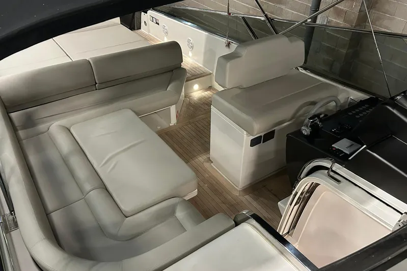  Yacht Photos Pics Luxurious interior of 2022 Itama 45s yacht with elegant seating and modern design.