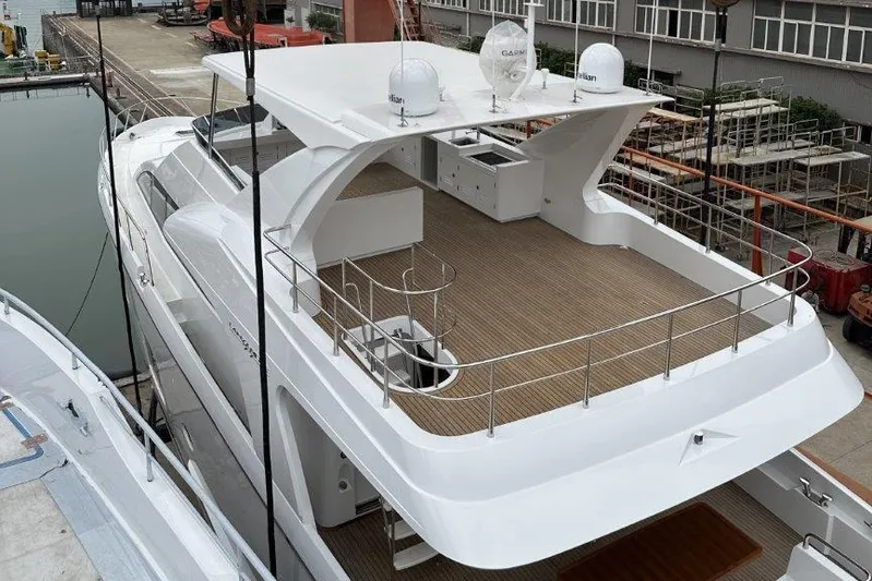  Yacht Photos Pics Luxury yacht Lanzarote 7702, 2025 model, docked with spacious deck and modern design.