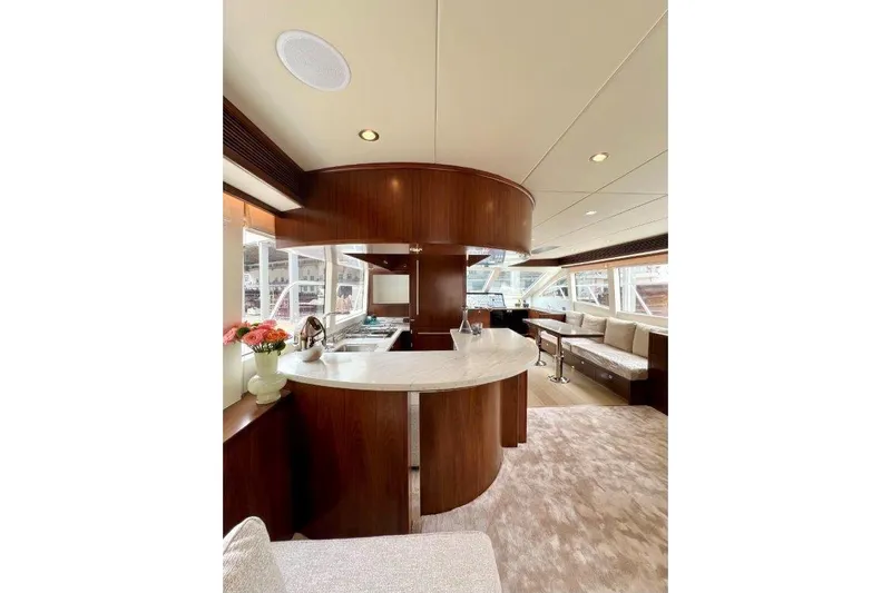  Yacht Photos Pics Luxurious interior of Lanzarote 7702 yacht, featuring elegant wood finishes and modern design, 2025 model.