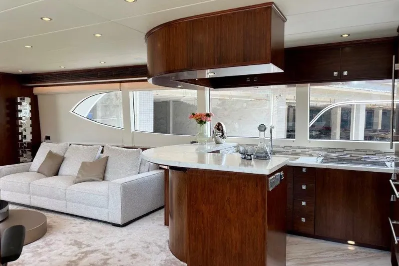  Yacht Photos Pics Luxurious Lanzarote 7702 yacht interior with modern kitchen and elegant seating, 2025 model.