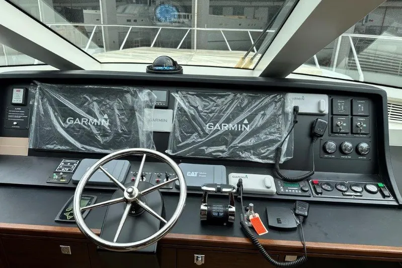  Yacht Photos Pics Cockpit of Lanzarote 7702 yacht, featuring Garmin navigation systems, 2025 model.