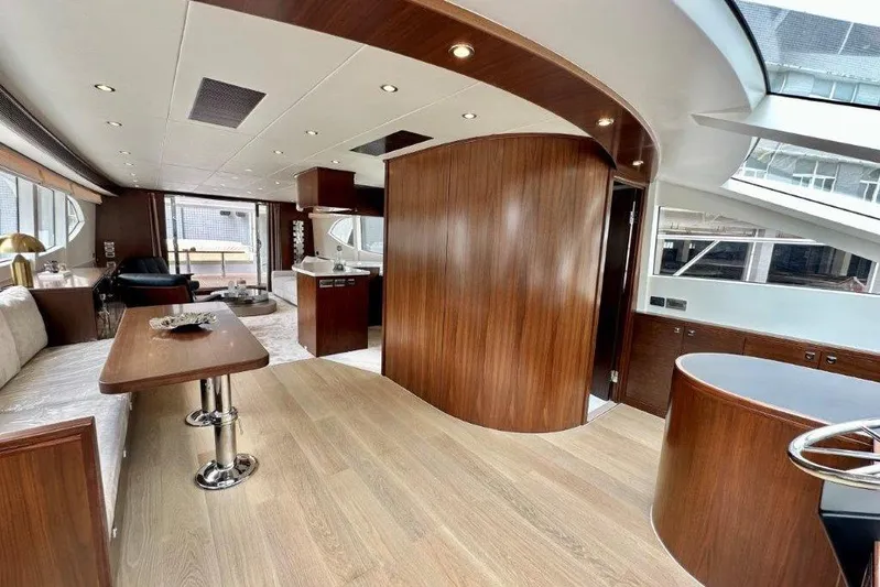  Yacht Photos Pics Luxurious interior of 2025 Lanzarote 7702 yacht with modern wood finishes and elegant design.