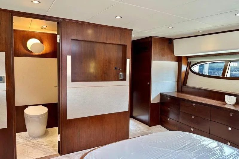  Yacht Photos Pics Luxurious Lanzarote 7702 yacht interior with elegant wood finishes, modern bathroom, and ample storage.
