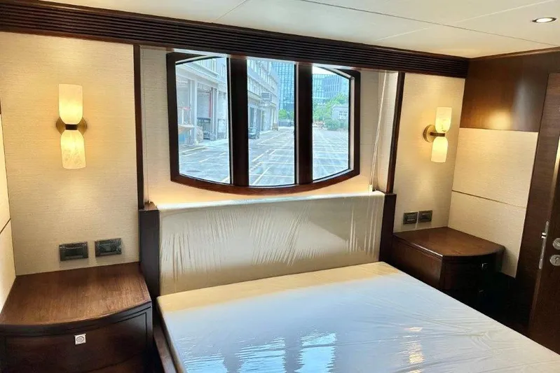  Yacht Photos Pics Luxurious Lanzarote 7702 yacht bedroom interior with elegant lighting and large windows, 2025 model.