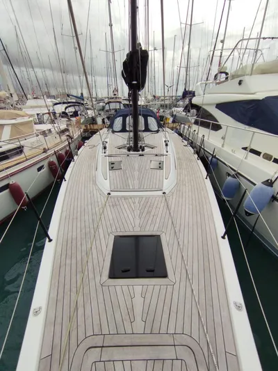 Loic Yacht Photos Pics Italia Yachts Italia 14.98, 2023 model, docked in a marina, showcasing sleek deck design.