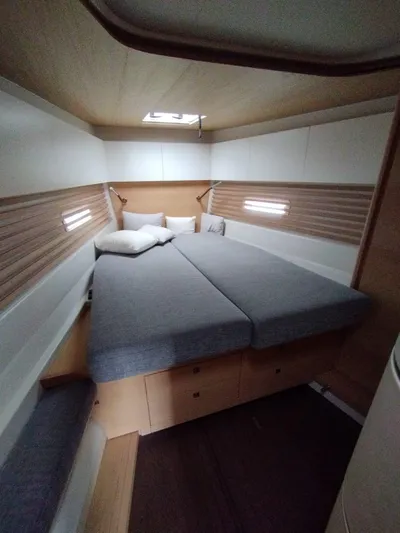 Loic Yacht Photos Pics Luxurious cabin interior of 2023 Italia Yachts Italia 14.98 with modern bedding.