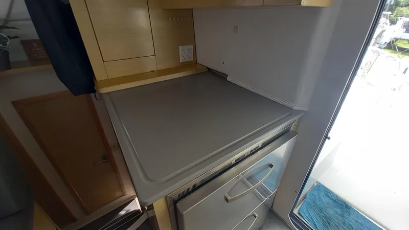 Double Trouble Yacht Photos Pics Interior of 2015 Fountaine Pajot Lipari 41 catamaran kitchen area with counter and storage.